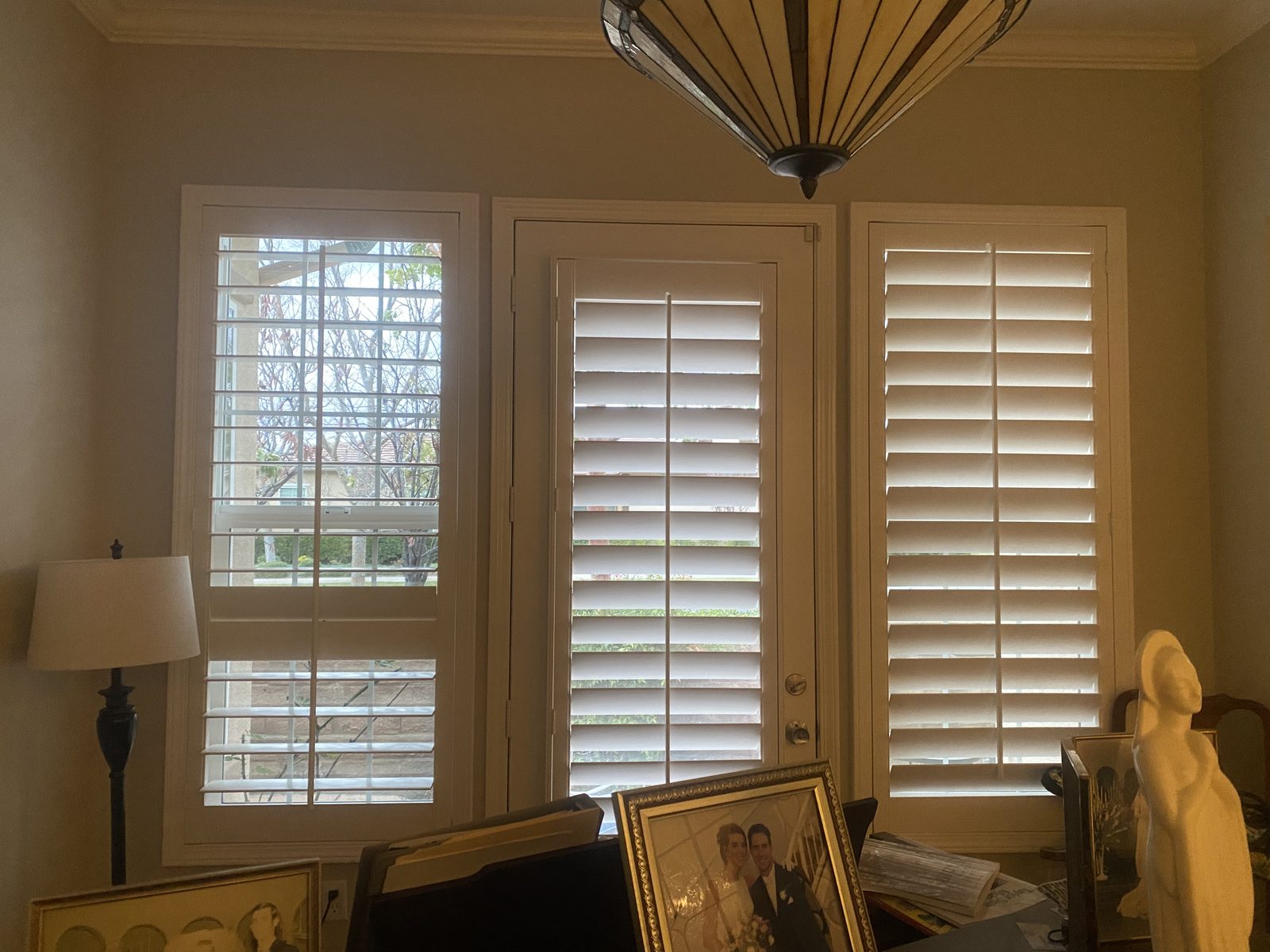 Plantation shutter panel taken off a sliding glass door during repair